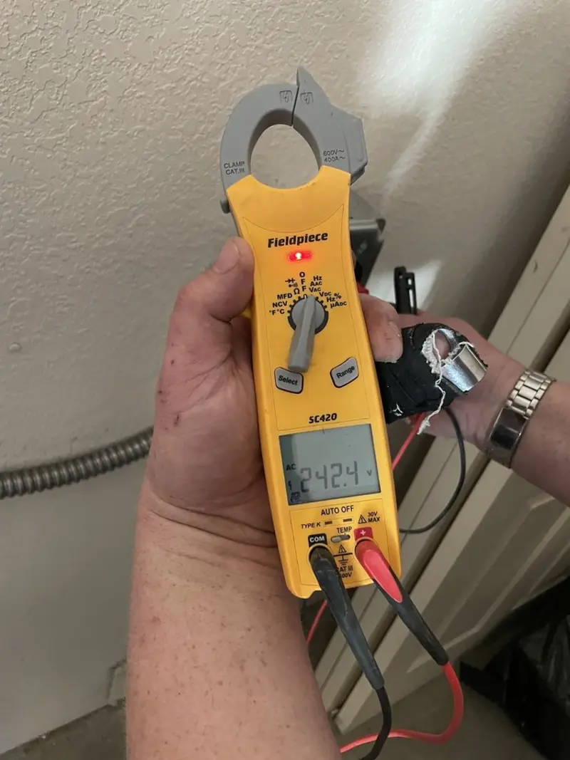Voltage testing with clamp meter during Generator Installation in Milaca